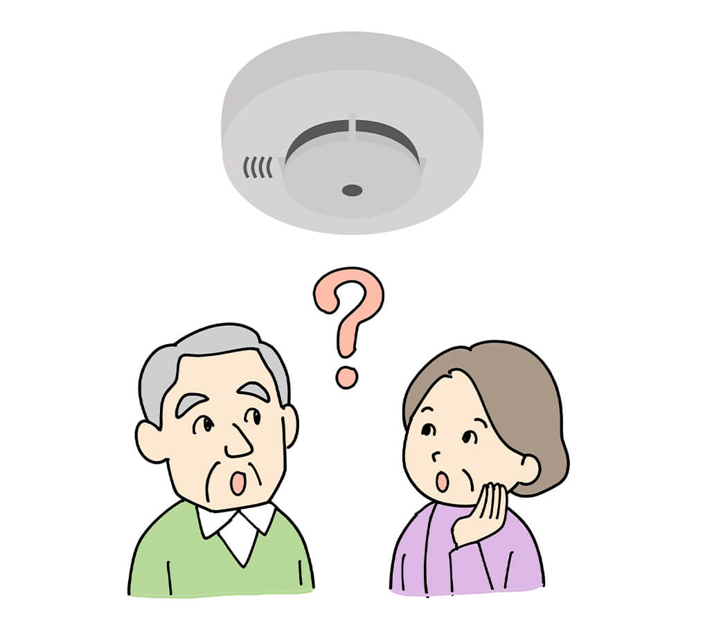 夫婦と火災報知器